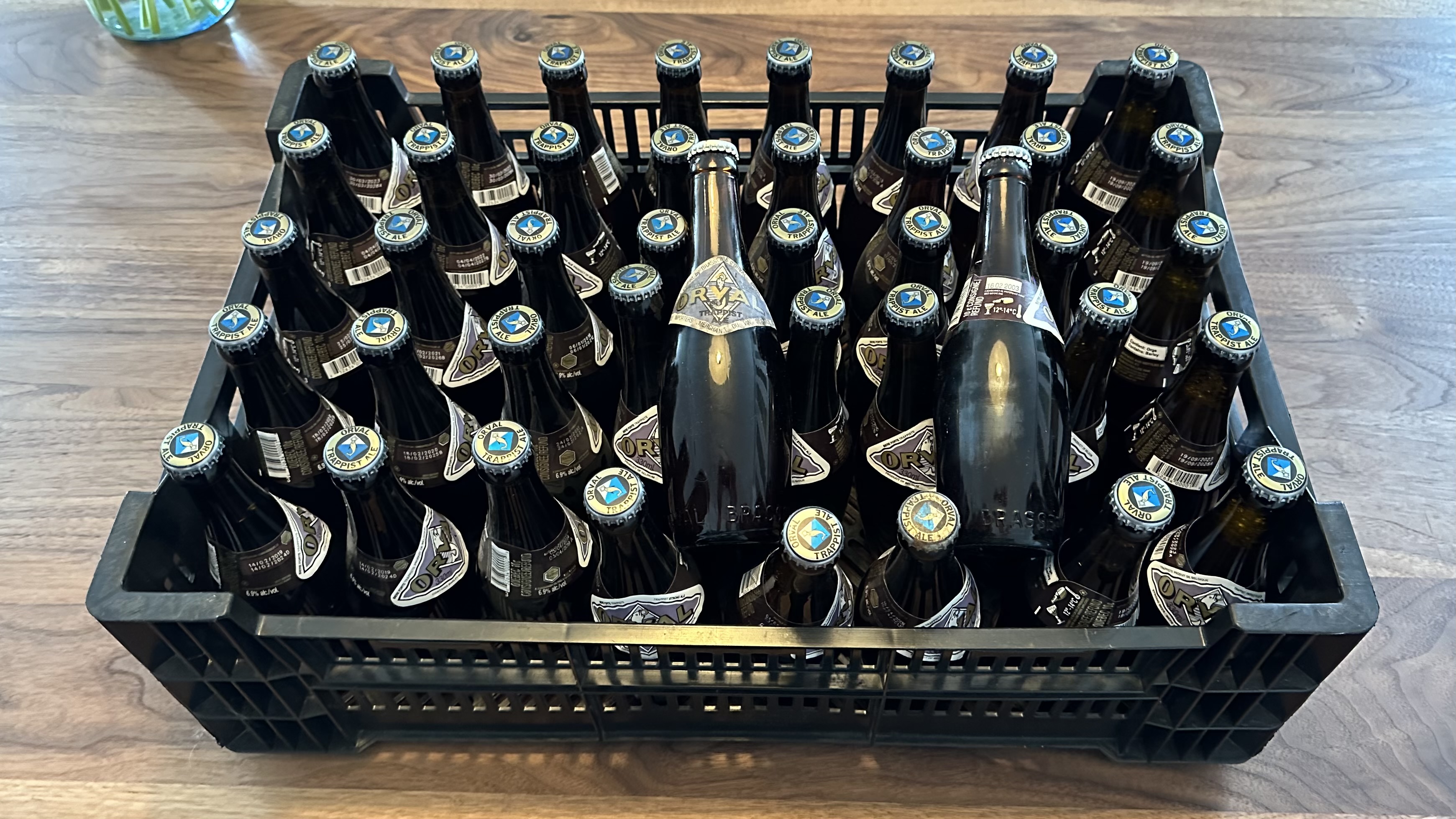 A crate of full Orval bottles.